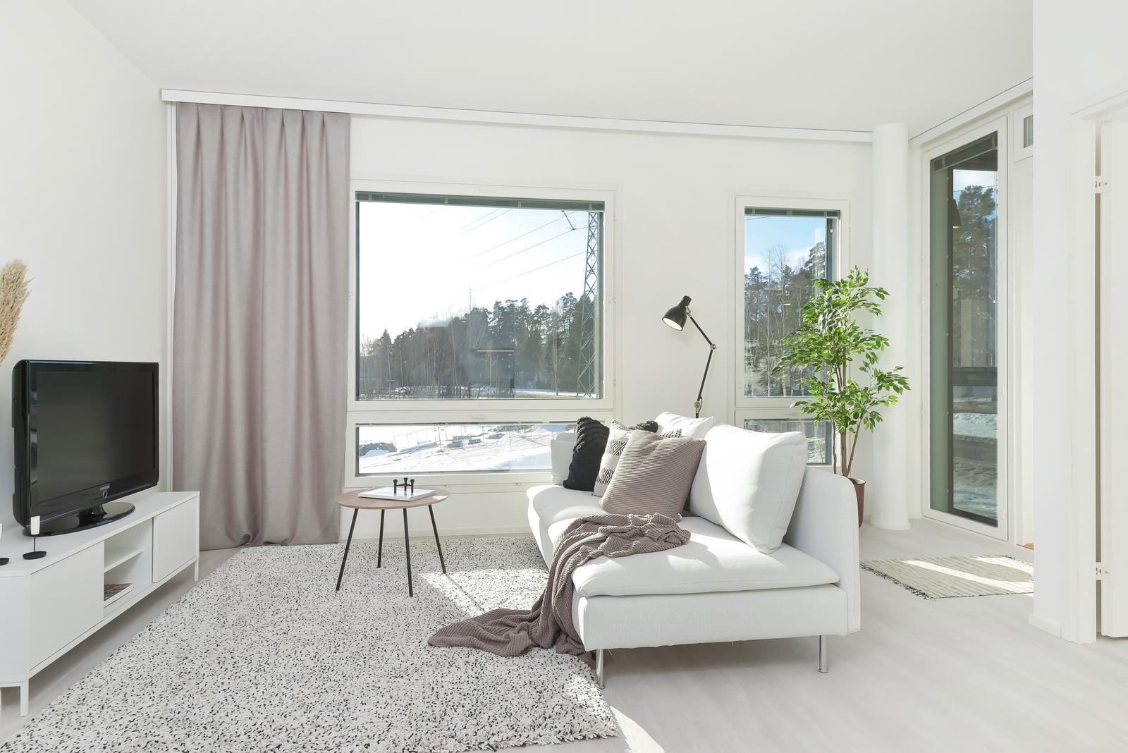 Pääkuva: stailattu huoneisto.